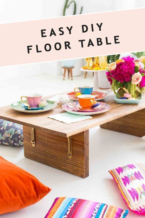 This DIY low floor table is so fun and perfect for floor seating! Make it yourself with our easy step by step tutorial and you can have a new table option for your next gathering. Surround it with comfy pillows and you have a great, boho-inspired option for your dinner parties. You can also take it outdoors for a picnic or backyard barbecue!  #diy #table #lowtable #floorseating #wood #simple #homedecor #diydecor Diy Floor Table, Luxury Picnic, Diy Table Decor, Comfy Pillows, Dekor Diy, Picnic Ideas, Floor Seating, Floor Table, Diy Flooring