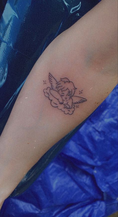 Sleeping angel baby by @afrochulatatto Sleeping Baby Angel Tattoo, Angel Looking Down Tattoo, Angle Sleeping Tattoo, Sleepy Tattoo Ideas, Sleeping Tattoo Ideas, Sleep Tattoo Ideas, Angel Sleeping On Cloud Tattoo, Baby Angel Tattoo Designs, Sleeping Angel