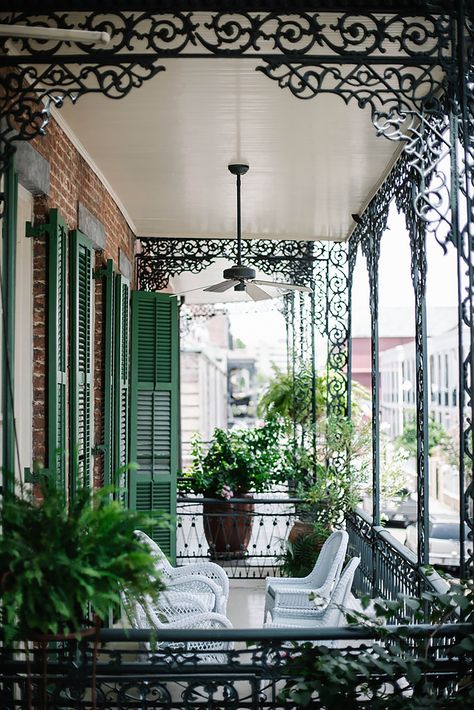 This iron porch adorned with ferns and crawling flora makes this a classic southern style Creole Interior, Southern Porches, Balkon Decor, New Orleans Style, The Big Easy, New Orleans Homes, New Orleans Travel, Big Easy, New Orleans Louisiana