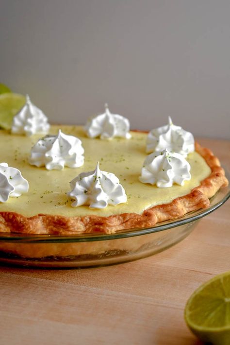 Best ever Key Lime Pie! Tart and sweet filling in a traditional pie crust. This authentic Florida pie is a delicious treat on a summer day. Key Lime Pie Tarts, Tart Key Lime Pie Recipe, Christmas Wreath Key Lime Pie, Traditional Key Lime Pie Recipe, Key Lime Pie Recipe With Cream Cheese, Key West Key Lime Pie Recipe, Authentic Key Lime Pie Recipe, Key Lime Pie Recipes, Key Lime Pie Easy