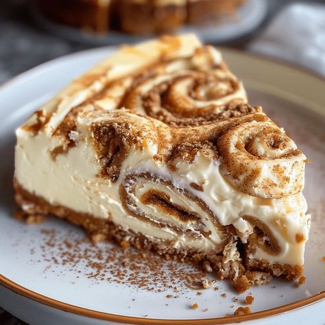 Cinnamon Roll Cheesecake combines rich cream cheese and a cinnamon swirl for a decadent dessert. Try this easy recipe today! Roll Cheesecake, Cinnamon Roll Cheesecake, Cheesecake Vegan, Salmon Patties Recipe, Patties Recipe, Funnel Cake, Cinnamon Rolls Recipe, Indulgent Desserts, Thanksgiving Desserts