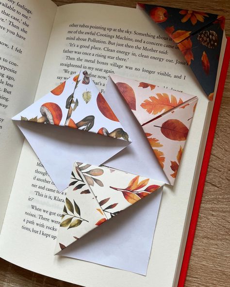 New! Origami page corner bookmarks- in my Etsy shop now. Only £3 for 4, all hand-folded by me. They make a lovely little extra when you gift someone a book or even nicer to keep yourself! #secretsantagift #secretsanta #secretsantaideas #bookmarks #gifts #giftsforreaders #booklovers Diy Bookmark Ideas, Gift Ideas For Readers, Homemade Bookmarks, Diy Bookmark, Diy Room Decor Videos, Handmade Bookmarks, Bookmark Ideas, Corner Bookmarks, Decor Videos