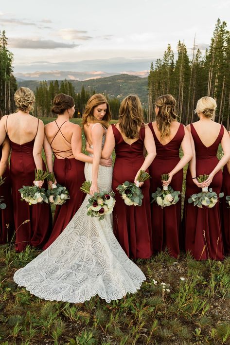 Love the different style of maroon bridesmaids dresses this group of women wore. They carried bridesmaid bouquets with white, pink, and maroon flowers. To see more of this TenMile Station wedding in Breckenridge check out the blog! Maroon And Pink Rustic Wedding, Maroon Wedding Theme Bridesmaid Dress, Burgundy Bridesmaid Dresses Bouquet, Marron Bridesmaid Dresses Long, Braidmaids Dress Red, Claret Wedding Colors, Bridesmaid Dresses Cranberry, Burgundy Bridesmaid Dresses With White Flowers, Wine Red Bridesmaids Dresses