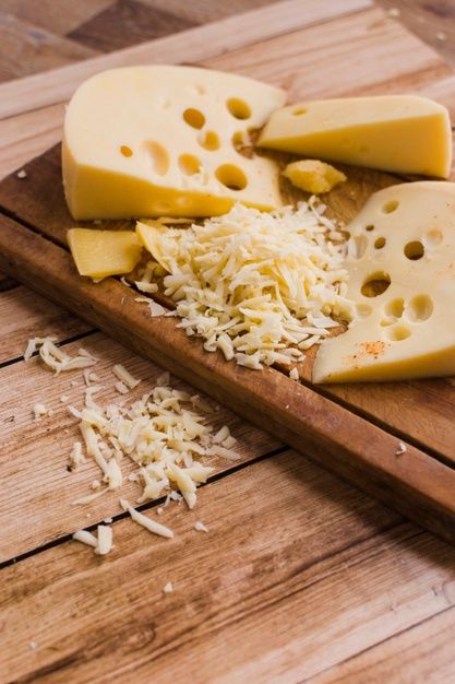 Grated cheddar cheese and slice of emmen... | Free Photo #Freepik #freephoto #food #wood #table #triangle Cheddar Cheese Aesthetic, Cheese Styling, Mini Cheese Board, Cheese Aesthetic, Baked Grilled Cheese, Honey Brie, Chedder Cheese, Egg Wraps, Cooking Baked Potatoes