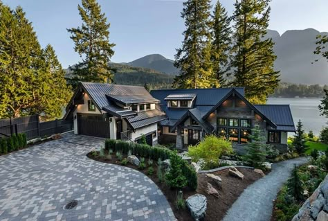 A striking hillside house overlooks a serene lake in British Columbia Hill Top House Design, Hillside Mansion Exterior, House Hillside, Hillside Mansion, Modern Timber Frame Homes, Modern Timber Frame, Old World Kitchens, Rustic Lake Houses, Timber Cabin