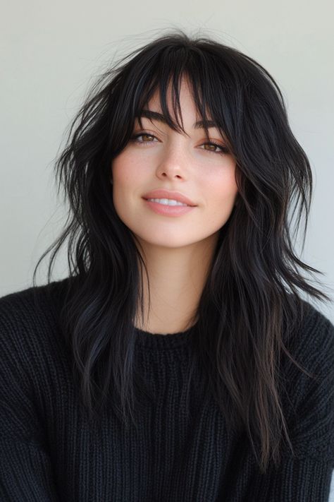 Click for More ➡️ | Save for Later ❤️A deep black base color paired with wispy bangs and long, graduated layers makes for a chic and dramatic statement. Perfect for sleek or tousled styles. (Midnight Black Shag with Wispy Bangs - Layered Shag Haircuts) Shag With Wispy Bangs, Graduated Layers, Layered Hair Ideas, Layered Shag, Square Face Hairstyles, Straight Layered Hair, Honey Blonde Highlights, Champagne Blonde, Shag Haircuts