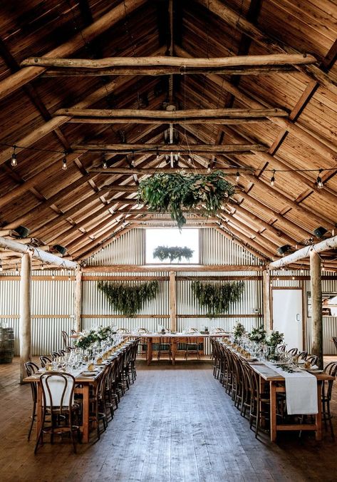 Rustic reception barn in NSW with exposed wooden beams, corrugated iron walls and wooden long table seating. Rustic Barn Wedding Reception, Event Venue Business, Farm Wedding Reception, Wedding Venue Business, Shed Wedding, Rustic Shed, Country Wedding Reception, Venue Business, Unique Wedding Receptions