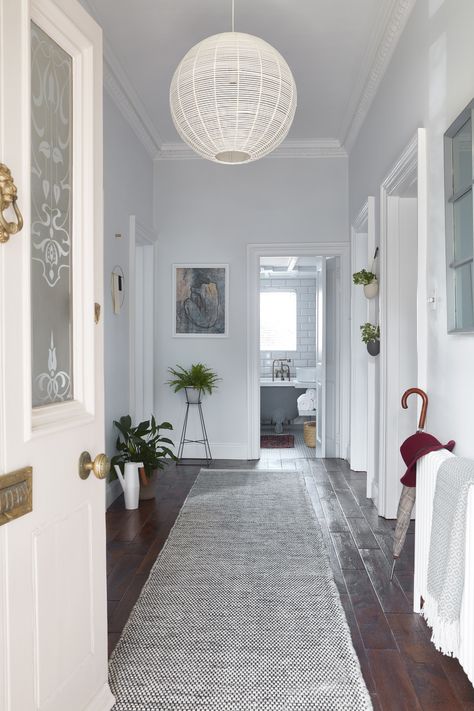 Hardwood floors look gorgeous in a hallway, but they do start to show dust and dirt around doorways quite quickly. So using a hallway rug to protect your floors from too much wear and tear makes sense. #hallway #woodflooring #realhomes Rug In Hallway, Hallway Runners Ideas Hardwood, Hallway Rugs Ideas, Hallway Runners Ideas, Hallway Colour Schemes, Entry Way Runner Rug, Black Wood Floors, Dark Wooden Floor, Hallway Paint