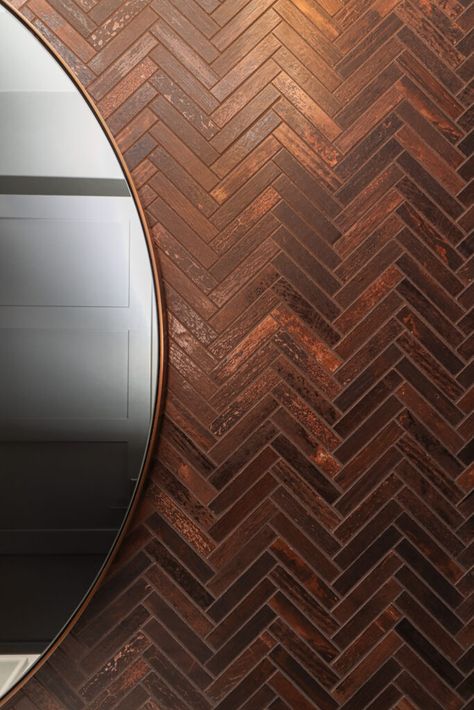 Chevron natural copper tile accent wall. Copper Accent Wall Bathroom, Fireplace With Copper Tile, Bronze Bathroom Tiles, Copper Shower Tile, Bathroom Copper Accents, Copper Shower Walls, Copper Tiles Bathroom, Accent Tile Bathroom, Copper Bedroom