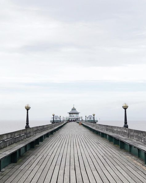 Abi Dare | These Four Walls on Instagram: “A quick phone snap of where we ended up spending the afternoon: Clevedon Pier, just outside Bristol. It’s one of my favourite places and we…” Clevedon Pier One Direction, Pier Wallpaper, Beach Pier Aesthetic, Snoopers Paradise Brighton, Clevedon Pier, London Dreams, Dubai Skyscraper, Photoshoot Locations, Bristol Uk