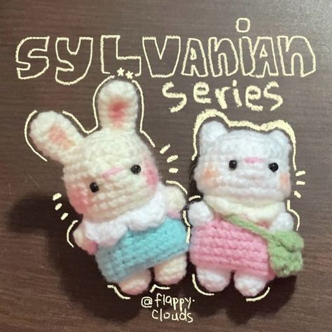 Meet my newest Sylvanian Family crochet creations: the adorable rabbit and cat duo! 🐰🐱 This was sold as keyrings.Handcrafted with love and attention to detail, these little ones are ready for all kinds of cozy adventures.Perfect for collectors, kids, or anyone who loves a touch of handmade charm in their lives. DM to know more details and prices. People Crocheting Aesthetic, Cute Handmade Crafts, Sylvanian Families Crochet Patterns Free, Calico Critter Crochet, Matching Crochet Ideas For Friends, Crochet Calico Critters, Crochet Sylvanian Family, Crochet Amigurumi Clothes, Crochet Ideas For Friends