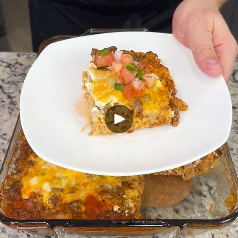 Tex-Mex Ramen Fiesta Casserole 😋 | Tex-Mex Ramen Fiesta Casserole 😋 | By Foodie's Time | Are starting with six uncooked
ramen blocks and we're going to just put one pound of cooked
ground beef right on top. Then, we're going to get half of a
diced white onion and spread that directly over the top and
we like spicy so we're going to go with this hot diced green
chilies just right on top of the onions. This is going to be
so flavorful you guys. Now, we're going to season all of
that with our taco seasoning. We're just going to put a
generous amount over the top of everything and this is going to
help season that meat, those onion and the noodles. Then, we
have two cans of red enchilada sauce. We're just going to pour
that on top of everything. You want to make sure every inch of
this gets Tex Mex Ramen Casserole, Tex Mex Ramen Fiesta Casserole, Ramen Ideas, Fiesta Casserole, Different Dinner Ideas, Tex Mex Casserole, Diced Green Chilies, Ramen Noodle Recipes, Mexican Casserole