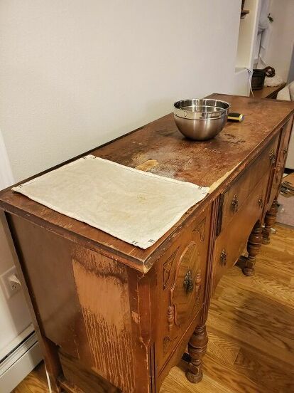 I have wanted an antique sideboard buffet for years! Unfortunately, they can be hard to find for a decent price. I typically see them, unfinished, going for around $500. That was way out of my price range, since I knew I would be repainting it.I was fortunate to find this beauty on the fB Marketplace, for $250! I wasn't about to let that one slip through my fingers! It definitely took some work; but in the end, she turned out exactly how I imagined! The orginal piece This is what she… Antique Sideboard Buffet Makeover, Minwax Gel Stain, Antique Sideboard Buffet, Repainted Furniture, Cabinet Storage Solutions, Antiques Repurposed, Buffet Makeover, Diy Wax Melts, Painted Buffet