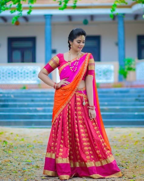 23 Elegant Saree Lehenga Designs For The South Indian Brides! | ShaadiSaga Celebrity Accessories, Half Saree Poses, South Indian Half Saree, Lehenga Shoot, Saree Lehenga Designs, Indian Half Saree, Lehenga Poses, Pink Half Sarees, Indian Bride Saree