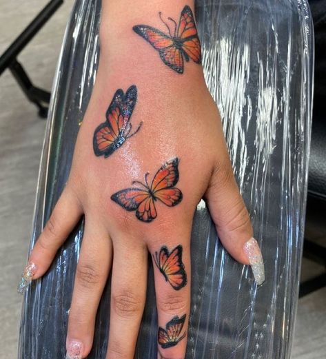 ˡᵃᵛⁱˢʰ ᵖᵒˢᵗ ᵖᵃᵍᵉ🧚🏽‍♀️ on Instagram: “butterfly hand tattoo inspo🦋 fav from 1-8? (@lavishbrincess🧚🏽‍♀️)” Hand Tattoos Baddie, Baddie Hand Tattoos, Hand Butterfly, Butterfly Hand Tattoo, Hand Tattoos For Girls, Cute Hand Tattoos, Pretty Hand Tattoos, Neck Tattoos Women, Butterfly Tattoos For Women