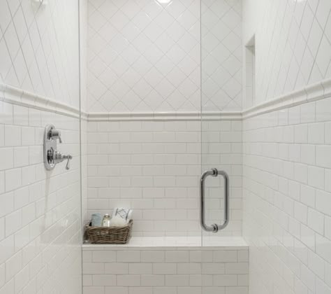 All white walk-in shower with diamond laid square tile upper wall over tile chair rail accenting the lower wall clad in subway tile with a built-in tiled bench White Tiled Bathroom, White Tile Shower, Subway Tile Showers, Tiled Bathroom, Shower Wall Tile, Bathroom Shower Walls, Master Shower, Tiled Shower, Shower Chair