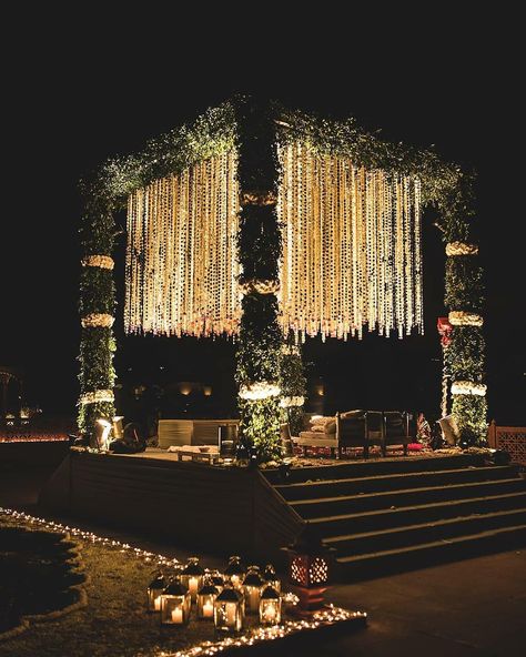 This gardenia mandap is oomphing out major decor goals . . Decor @auraaffaire Originally Featured on @weddecor.in . . . Follow us for more decor inspiration for your dream wedding.First premium page for all your decor fantasies. Tag us @weddecor.in to get featured. Email your original work at weddecorindia@gmail.com #weddecor #mandapdecor #intimatemehndi #intimateweddings #haldidecor #mehndidecor #fun #calmingdecor #beautifuldecor #weddinginspiration #weddingdecor #indianweddings #weddin Wedding Mandap Decoration Night, Luxury Wedding Decor Indian, Marriage Mandap Decoration Indian Night, Indian Wedding Decor Aesthetic, Mandap Design Night, Mandap Decor Night, Mandap Designs Outdoor Night, Mandap Decor Indian Outdoor Night, Night Wedding Mandap Decoration