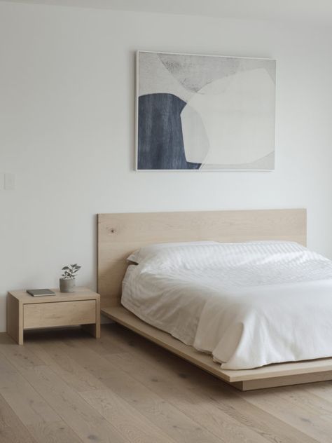 A Warm and Tactile Apartment Reinvention by studioplusthree | est living Light Timber Flooring, Light Wood Bed, Oak Floorboards, Bed Wooden, Est Living, Minimalist Apartment, Timber Furniture, White Bed, Wood Bed