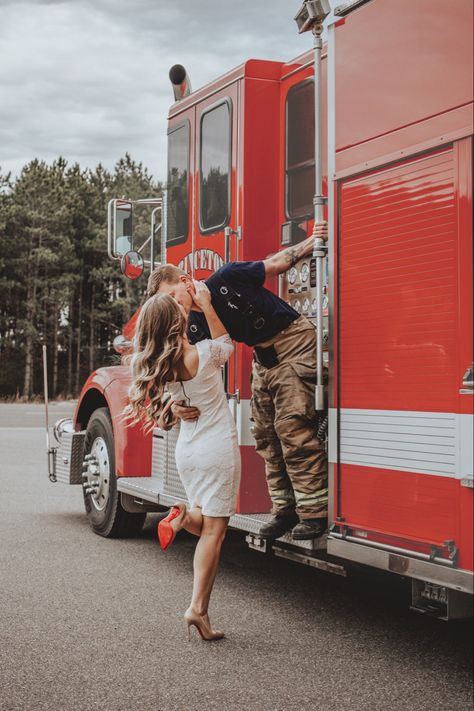 Firehouse Wedding Reception, Firefighter Nurse Engagement Pictures, Fire Dept Engagement Pictures, Firefighter Proposal Ideas, Firehouse Wedding Photos, Fire Truck Wedding Photos, Firefighter Romance Aesthetic, Fireman Engagement Pictures, Firefighter Couple Aesthetic