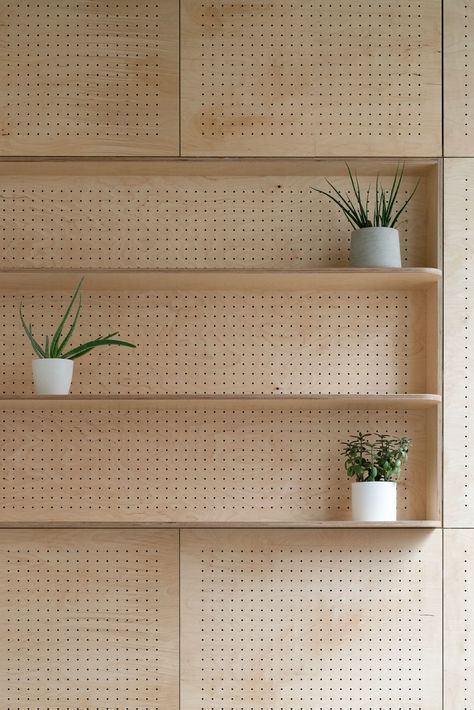 We proposed an integrated bespoke pegboard for this Dalston creative studio. It works both as a perfect backdrop for meetings and video conferencing, as well as aiding the acoustics of the space. Design by @companyofthings Fabrication by @commissioned_by_you Photo by @claudia_agati_ Large Peg Board Wall, Pegboard Office Wall, Pegboard Furniture, Peg Board Design, Plywood Joinery, Pegboard Design, Peg Board Walls, Creative Studio Space, Clinic Interior