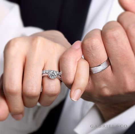 Found the love of your life? Check! Magical proposal? Check! Then check out our matching rings inspiration blog!  #engaged #engagementring #weddingring #weddingband #rings #diamondring #marriage #wedding #weddingplanning#GabrielNY #DiamondJewelry #FineJewelry#gabrielengagementring #gabrielring #gabrielwedding#Men's#Band Couple Ring Photography Hands, Wedding Rings On Hands, Men Proposal Ring, Couple Ring Photography, Cincin Pernikahan Wedding Ring Couple, Engagement Rings Photography, Wedding Ring Poses, Marriage Rings Couple Unique, Ring Photoshoot Ideas