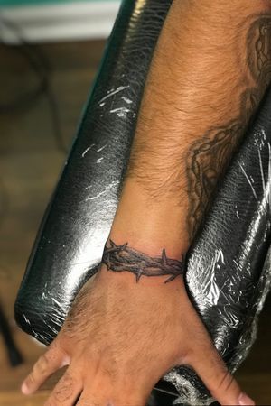 Tattoo uploaded by Roger Picasso Hora • Thorns on wrist tattoo! • Tattoodo Crown Of Thorns Tattoo Around Wrist, Wrist Thorn Tattoo, Thorn Wrist Tattoo Men, Christian Spine Tattoo Men, Thorn Ring Tattoo, Thorns Around Wrist Tattoo, Best Looking Tattoos For Men, Thorns Wrist Tattoo, Thorns Crown Tattoo