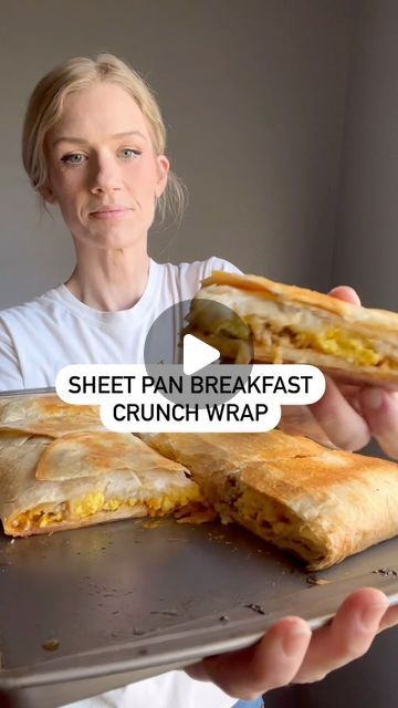 Andrea on Instagram: "Sheet Pan Breakfast Crunchwrap

1. Take a sheet pan and spray with a little oil.
 Lay 5 burrito tortillas down with one in the  middle and the edges hanging off.(video before this for reference)
2. Now spread Taco Bell chipotle creamy sauce on the first layer.
3. Take 8 cooked hash brown patties for the next layer.
4. Top with cooked eggs.
5. Now top with one pound of cooked sausage or bacon.
6. Last layer will be 1 1/2-2 cups of shredded cheese. 
7. now take 3 more burrito tortillas and lay them on top wrapping them under a bit too.
8. Spray top with oil.
9. Lay another cookie sheet on the top.
10. Bake at 450 degrees for 15-20 minutes.
11. Enjoy!!

Ingredients:

8 burrito tortillas 
Taco Bell chipotle creamy sauce
8 hash brown patties
4-8 eggs
1 pound sausage or bac Sheet Pan Breakfast Quesadilla, Easy Breakfast Burritos Simple, Tortilla Breakfast Ideas, Bacon Breakfast Ideas, Breakfast Crunch Wrap, 5 Minute Breakfast, Taco Bell Breakfast, Sheet Pan Breakfast, Breakfast Crunchwrap