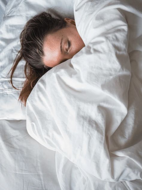 REM Sleep: Why It Matters & How To Get More Of It | SheerLuxe Rapid Eye Movement, Woman Sleeping, Sleep Is Important, Eye Movement, Rem Sleep, White Sheets, Healthy Brain, Lifestyle Habits, Brain Development