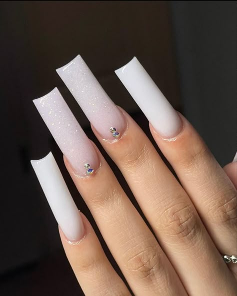 White Nails With One Finger Design, All White Acrylic Nails, Long Nails With Diamonds, Acrylic Nails Milky White, White Nails Rhinestones, Basic Long Nails, White Base Nails, Basic White Nails, Nut White Nails