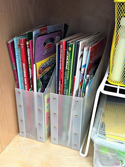 Such a great way to organize coloring books! Organizing Coloring Books, Organize Coloring Books, Coloring Books Storage Ideas, Playroom Book Organization, How To Organize Coloring Books, Coloring Supplies Organization, Coloring Book Organization Kids, Coloring Book Storage Ideas, Coloring Book Organization