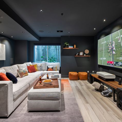 75 Home Theater with Black Walls Ideas You'll Love - March, 2024 | Houzz Game Room And Theatre Room, Large Sectional Sofa Basement, Bonus Room Theater, Home Theater Basement Media Rooms, Home Theater Gaming Room, Playroom Theater Room, Basement Ideas Theater, Game Room Family Modern, Game Room Media Room Combo