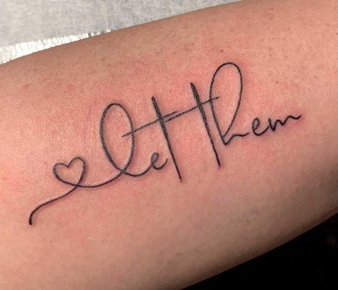 This Tattoo has gone viral along with its poem, have you read it yet? “Let Them” “Just Let them. If they want to choose something or someone over you, LET THEM. If they want to go weeks without talking to you, LET THEM. If they are okay with never seeing you, LET THEM. If they are okay with always putting themselves first, LET THEM. If they are showing you who they are and not what you perceived them to be, LET THEM. If they want to follow the crowd, LET THEM. If they want to jud... The Word Delicate Tattoo, Beautiful Sayings Tattoos, Rise Up Tattoo Symbol, Let Them Tattoo Design, Tatoos Woman Let Them, Cute Thumb Tattoos, We Got This Tattoo, Trending Tattoos For Women 2024, Self Worth Tattoo Ideas