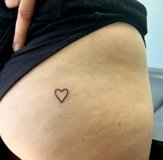 Heart On Buttcheek Tattoo, Heart Tattoo Buttcheek, Heart Tattoo On Bum Cheek, Dainty Lower Back Tattoos, Buttcheek Tattoo, Buttocks Tattoo, Tattoo 101, Birthday Tattoos, Tramp Stamps