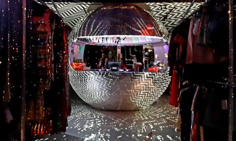 Giant Disco Ball counter inside a Vintage Concept Store Disco Globe, Giant Disco Ball, Vintage Concept, Vintage Garage, Edgy Streetwear, Festival Gear, Vintage Marketplace, Disco Ball, Time Out