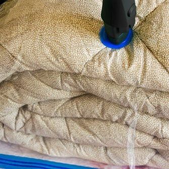 5 Tips on How to Store Bedding | Family Handyman Ways To Store Bedding, Where To Store Comforters, Summer Comforter, Store Bedding, Comforter Storage, Swamp Cooler, Cedar Boards, King Size Comforters, Extra Shelf