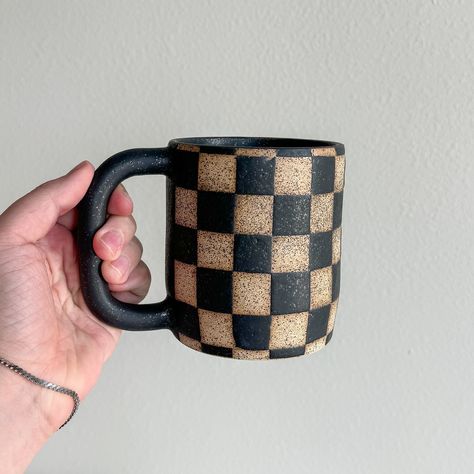 I don’t make these often because they’re time-consuming, but I always love the result! I use electric tape and an x-acto knife to make the checkered patten. 🏁 #mugshotmondays • • #pottery #potterymichigan #michiganpotters #potteylove #potteryinspo #checkeredmugs #etsysellers #etsy #etsygifts #handmadeindetroit #potterybyariel #coffeemug #handmademug Checkered Mug, Mug Pottery, Detroit Michigan, Made Goods, Mug Shots, Ariel, Etsy Gifts, Stoneware, Etsy Seller