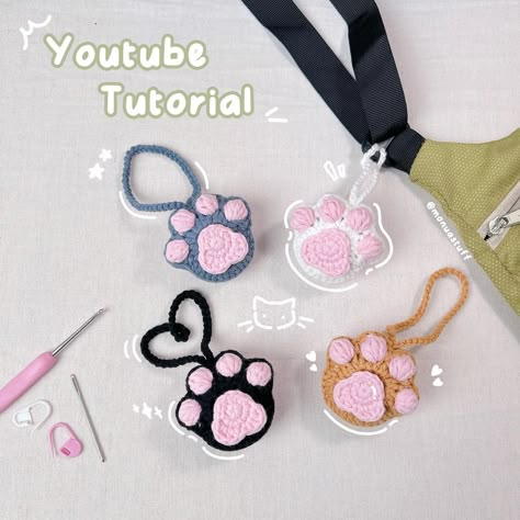 It’s been a while since I last uploaded anything due to personal reasons, but I’m back now with a new tutorial! 😁🥰 What do you guys think of this low-sew Cat Paw Bag Charm? 🐈 🐾 Check out my latest video on Monua DIY on YouTube! I’m sure it will take less than 20 minutes to create your own bag charm or keychain. Have fun crafting! (^_−)−☆ #crochet #tutorial #crocheting #bag #bagcharm #cat #catsofinstagram #catlover #catpaw #accessories #cute #diy #beginner #freepattern #crochetpattern #free... Crochet Paw Keychain, Cat Paw Crochet Pattern, Crochet Charms For Bags, Paw Crochet Pattern Free, Cat Crochet Accessories, Crochet Plushie Keychain, Crochet Bag Charms Free Pattern, Bag Charms Crochet, Cat Paw Crochet