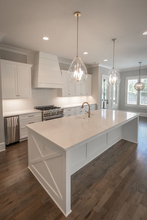 Pristine white kitchen with brass hardware and finishes Modern Kitchen Design White Shaker Cabinets, Kitchen Small White Cabinets, White Countertops White Cabinets Kitchen, White Kitchen Gold Hardware Stainless Steel Appliances, White Shaker Kitchen Island, Farmhouse Kitchen Island White, Brass Hardware On White Cabinets, White And Good Kitchen, White Kitchen Cabinets With Chrome Hardware