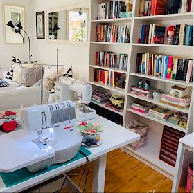 The Itinerant Seamstress: 10 real-life sewing rooms Sewing Space In Living Room, Sewing Area In Living Room, Sewing Room Shelves, Organizing Sewing Supplies, Small Sewing Room Design, Small Sewing Room Ideas Layout, Sewing Areas For Small Spaces, Sewing Room Ideas Layout, Sewing Workshop Studio