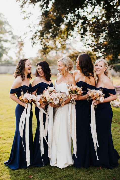 Smiling bride and bridesmaids at Elmore cost wedding in navy blue bridesmaid dresses Navy Blue And Rose Gold Wedding Bridesmaid Dresses Bridal Parties, Black Tie Wedding Blue Bridesmaids, Nautical Bridesmaid Dress, Navy Blue And Champagne Wedding Colors, Dark Blue Bridesmaids, Navy Blue Bridal Party, Bridesmaid Dresses Dark Blue, Long Navy Blue Bridesmaid Dresses, Midnight Blue Bridesmaid Dresses