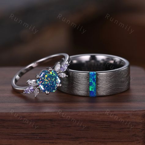 Here we have a Blue Fire Opal Ring Set for Couples, Matching Promise Ring Set, His and Hers Wedding Ring, Silver and Tungsten Ring, Hexagon cut Opal Engagement Ring Anniversary rings. ITEM DESCRIPTION ✦ Handmade, high-quality item! ✦ Material: Sterling Silver/Tungsten ►Sold as a two-piece set ►His ring is Silver Tungsten Carbide with Baguette Blue Opal ►His band width: 8mm ►His tungsten ring will not turn green itself and will not cause your skin to turn green.  ✦ Durable - Incredibly Scratch-Re Rings His And Hers, Blue Opal Wedding Rings, Cheap But Beautiful Engagement Rings, Couple Promise Rings Matching Set, Promise Rings Matching Set, Blue Engagement Ring Silver, Silver And Blue Wedding Ring, Wedding Rings Ideas Couple, Blue Purple Wedding Rings