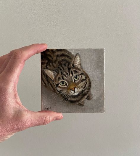 I’m really enjoying the challenge of painting mini oil portraits lately - especially mini cat portraits . This little one measures 10cm x 10cm and is done in oil on canvas panel. A teeny tiny tabby cat … which brings back memories of my Gizmo 🌈 🐾 #catlovers #minature #minatureart #petportrait #petportraitartist #catart #catartists #cats_of_world #oilpainting #oiloncanvas #petlover #crazycatlady #catstagram #tabbycat #tabbykittens #tabby #tabbiesoftheworld #rescuecats #irelandart Tabby Cat Painting, Mini Canvas Paintings, Cat Portrait Painting, Pet Portrait Paintings, Mini Oil Painting, Cats Art Drawing, Oil Portraits, Mini Easel, Mini Cat