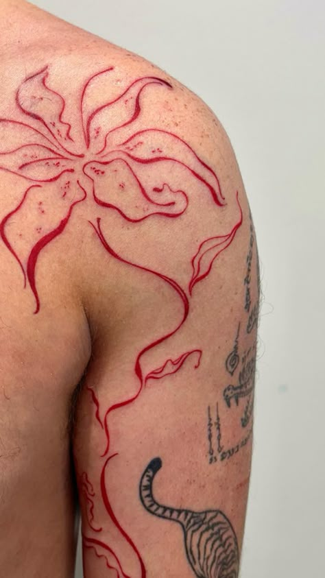 Red Lily flower tattoo Red Ink Shoulder Tattoo, Red Lilies Tattoo, Spider Lily Tattoo Stencil, Lilly Tattoo Men, Flame Lily Tattoo, Dragon Lily Tattoo, Fire Lily Tattoo, Red Lines Tattoo, Red Traditional Tattoo