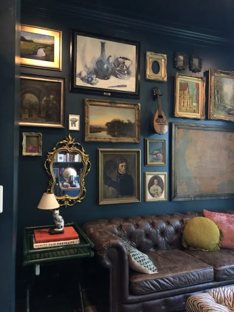 The Study Victorian Living Room Wall Art, Moody Victorian Library, Black Wall Home Office Ideas, Moody Living Room Chesterfield, Bookends On Mantle, Vintage Office Wall Decor, Bright Colored Decor, Dark Craftsman Interior, Dark Cottage Living Room Ideas