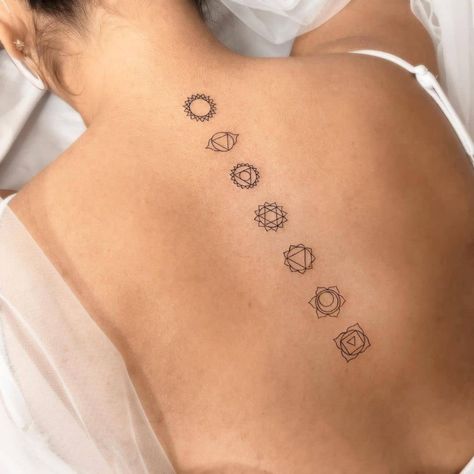 Young Talent Expresses His Artistic Side Through Minimalist Tattoos Chakra Line Tattoo, Tattoo Ideas Female Chakra, Dainty Chakra Tattoo, Chakra Tattoo Minimalist, Fine Line Chakra Tattoo, Chakra Lotus Tattoo, Yoga Fine Line Tattoo, Minimalist Chakra Tattoo, Chakra Tattoo Back