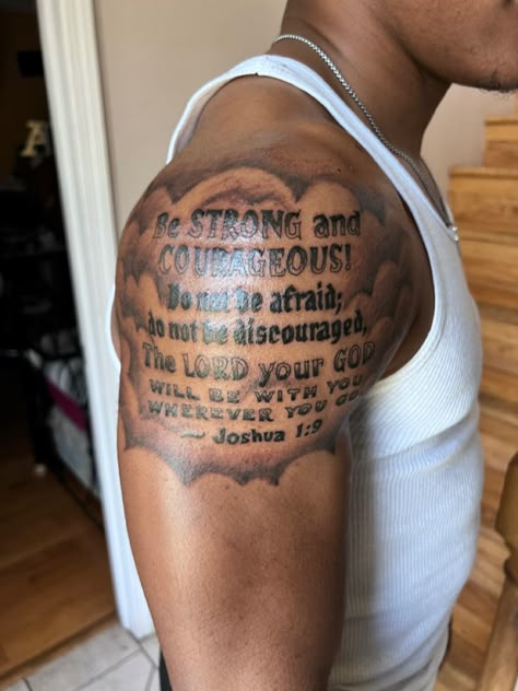 Upper Arm Quote Tattoo Men, Lion Tattoo With Words, Small Upper Arm Tattoos For Guys, Bible Verse Tattoos For Men Upper Arm, Religous Tattoo Quotes Men, Top Of Shoulder Tattoo Men Ideas, Scripture Tattoos For Men Shoulder, Small Shoulder Tattoos Men, Shoulder Tattoo Men Bible Verse