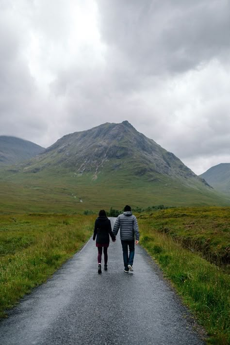 Couple walking through the rain in Glen Etive, Scotland | free image by rawpixel.com / Jack Anstey Relax Woman, Nature Aesthetic Videos, Walking Images, Couples Holding Hands, Couple In Rain, Scotland Aesthetic, Glen Etive, Mountain Couple, Rain Pictures