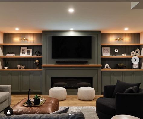 Built In Decor Ideas, Built In Entertainment Center Paint Colors, Basement Faux Beams, Basement Fireplace With Tv Built Ins, Green Built In Entertainment Center, Built In Basement Entertainment Center, Basement Living Area Ideas, Man Cave Entertainment Center, Modern Farmhouse Basement Family Room