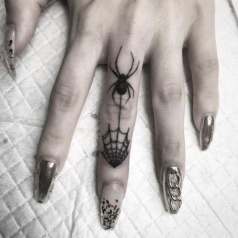 70+ unique and striking finger tattoo designs: symbols, hennas, roses, snakes, dots, lettering, hearts, and wedding rings for couples. Bonus: tattoo meanings. Tattoos For Women Delicate, Tattoo Designs Symbols, Finger Tattoos For Women, Wedding Rings For Couples, Simple Finger Tattoo, Meaningful Symbols, Finger Tats, Finger Tattoo For Women, Knuckle Tattoos