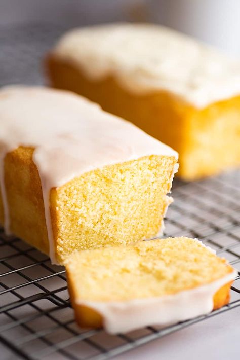 Incredibly moist and tangy Small Lemon Pound Cake that makes two adorable mini loaves. | #LemonDesserts | #PoundCake | #SmallBatch | Small Pound Cake, Small Batch Desserts, Mini Loaf Cakes, Desserts For Two, Butter Pound Cake, Moist Lemon Cake, Lemon Loaf Cake, Lemon Pound Cake Recipe, Small Batch Recipes